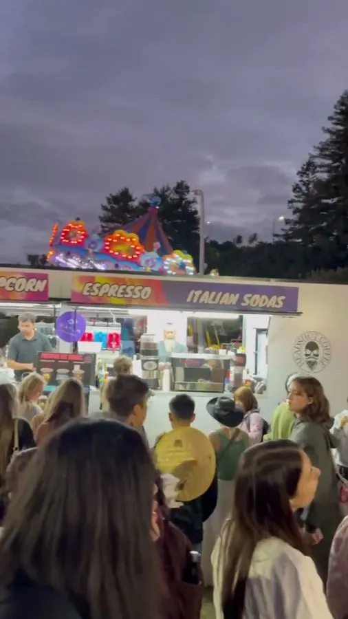 Queue at the trailer at dusk