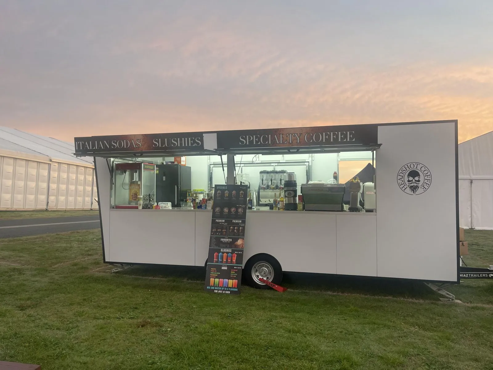 The Headshot Coffee trailer at dawn, side-on