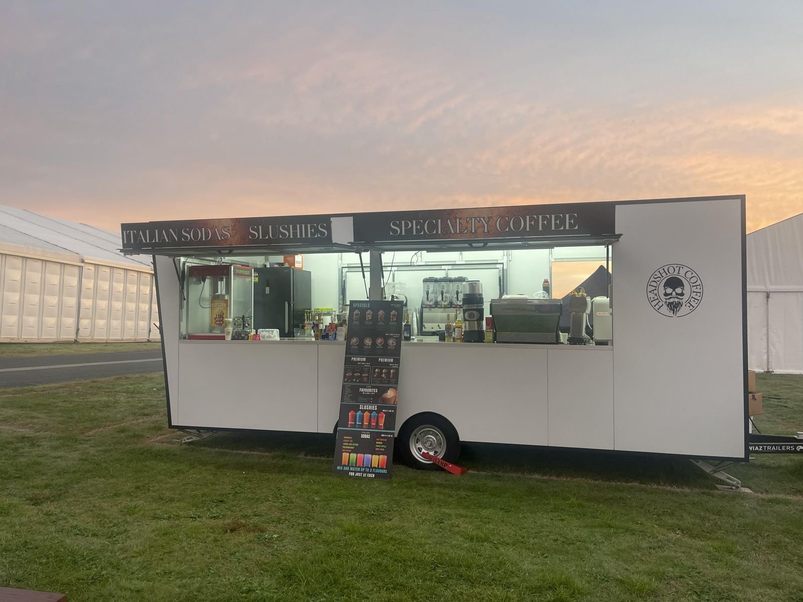 The Headshot Coffee trailer at dawn, side-on